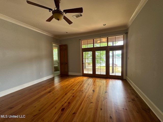 162 Lake Ridge Dr, Madison, MS 39110 - spare room featuring ornamental molding, hardwood / wood-style floors, ceiling fan, and baseboards
