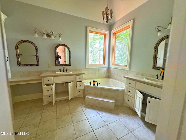 162 Lake Ridge Dr, Madison, MS 39110 - bathroom with tile patterned floors, a chandelier, a bath, and two vanities