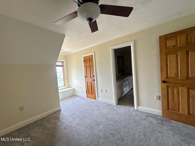 162 Lake Ridge Dr, Madison, MS 39110 - unfurnished bedroom featuring carpet, baseboards, ornamental molding, connected bathroom, and ceiling fan
