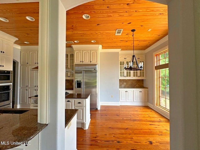 162 Lake Ridge Dr, Madison, MS 39110 - kitchen with built in fridge, wooden ceiling, light wood-type flooring, recessed lighting, and glass insert cabinets
