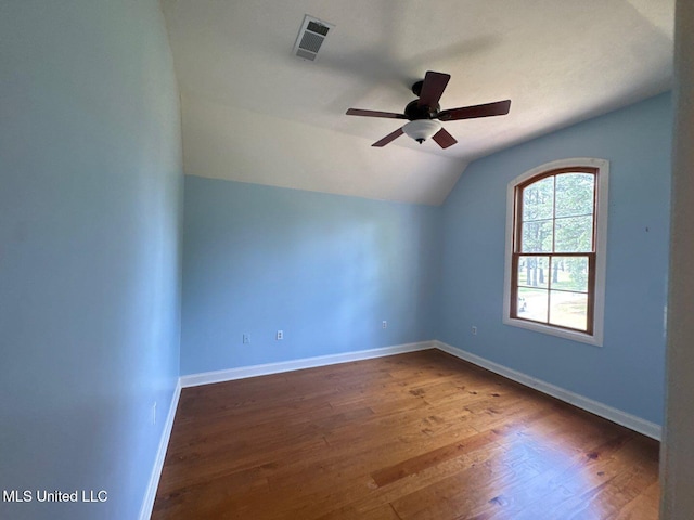162 Lake Ridge Dr, Madison, MS 39110 - empty room featuring vaulted ceiling, ceiling fan, wood finished floors, and baseboards