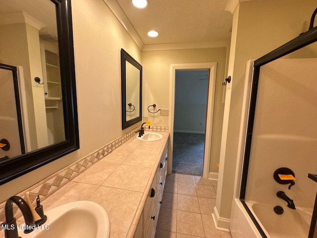 162 Lake Ridge Dr, Madison, MS 39110 - bathroom with recessed lighting, double vanity, bath / shower combo with glass door, tile patterned floors, and baseboards