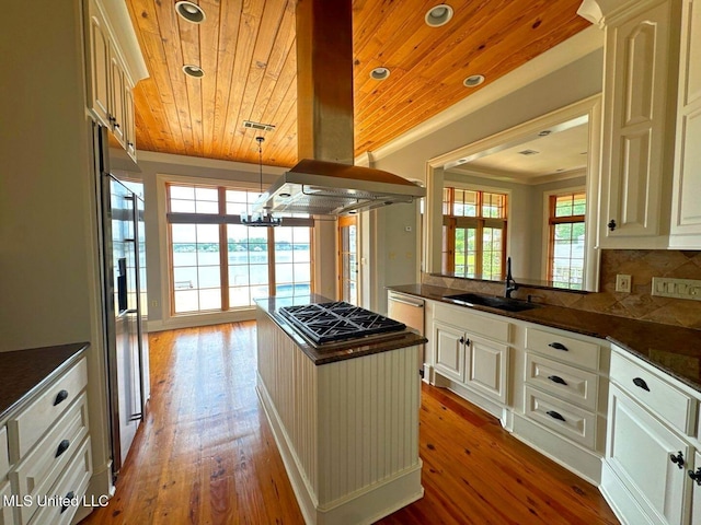 162 Lake Ridge Dr, Madison, MS 39110 - kitchen featuring a sink, dark countertops, wood ceiling, gas stovetop, and island range hood