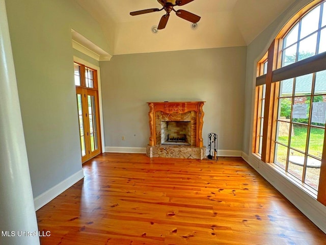 162 Lake Ridge Dr, Madison, MS 39110 - unfurnished living room featuring ceiling fan, wood finished floors, a fireplace, baseboards, and high vaulted ceiling