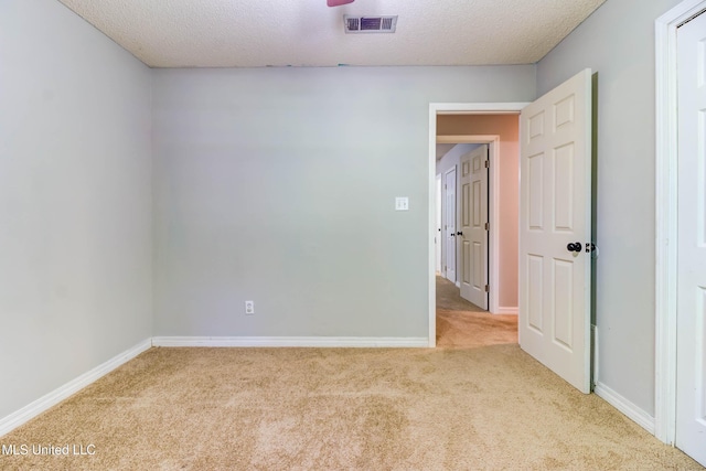 3217 N 2nd St, Ocean Springs, MS 39564 - carpeted spare room featuring baseboards