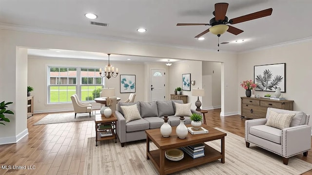 112 Eastgate Cir, Forest, MS 39074 - living room featuring ornamental molding, light wood-style floors, a ceiling fan, a chandelier, and recessed lighting