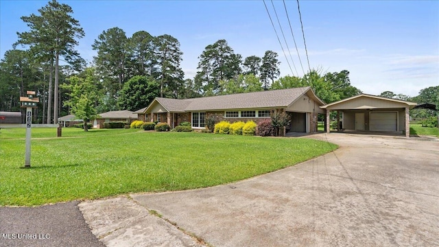 112 Eastgate Cir, Forest, MS 39074 - ranch-style house with a front yard, an attached garage, and driveway