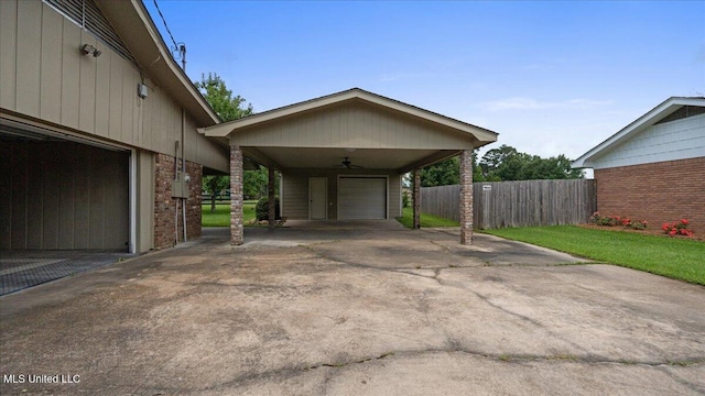 112 Eastgate Cir, Forest, MS 39074 - view of car parking with a garage and ceiling fan