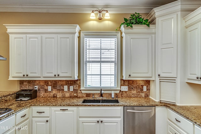 kitchen with tasteful backsplash, appliances with stainless steel finishes, a sink, and crown molding