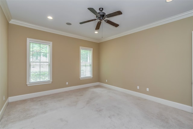 unfurnished room with baseboards, ornamental molding, and a healthy amount of sunlight