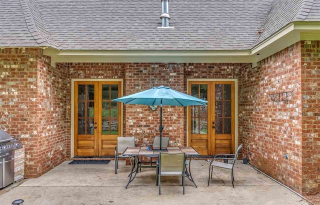 view of patio with french doors and area for grilling