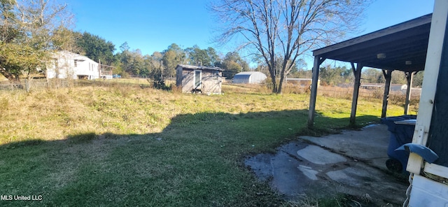 view of yard with a storage shed