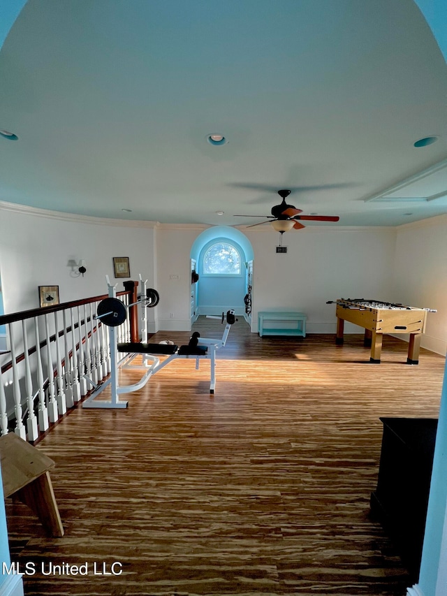 game room with crown molding, hardwood / wood-style floors, and ceiling fan