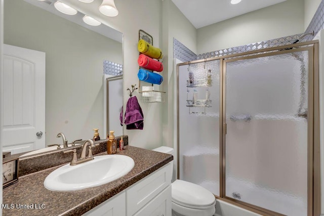 10714 Lilinoe Way, Diamondhead, MS 39525 - bathroom with a shower stall, toilet, and vanity