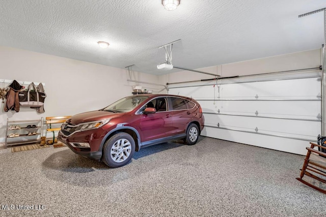10714 Lilinoe Way, Diamondhead, MS 39525 - garage featuring a garage door opener