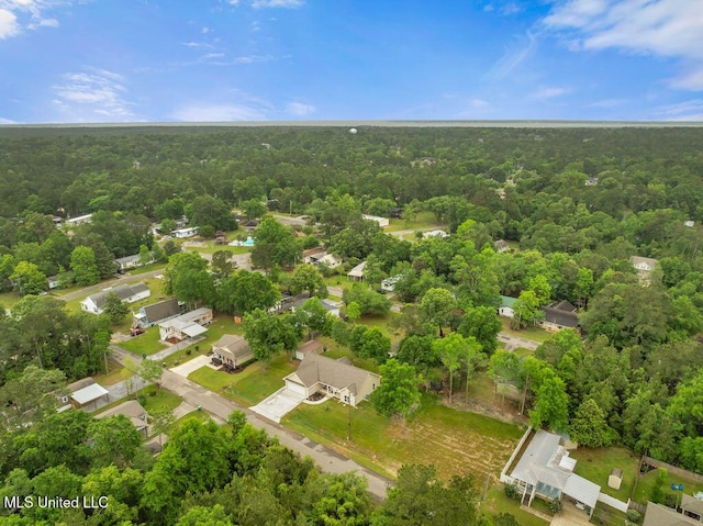 10714 Lilinoe Way, Diamondhead, MS 39525 - drone / aerial view with a residential view and a wooded view