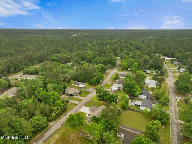 10714 Lilinoe Way, Diamondhead, MS 39525 - birds eye view of property featuring a wooded view
