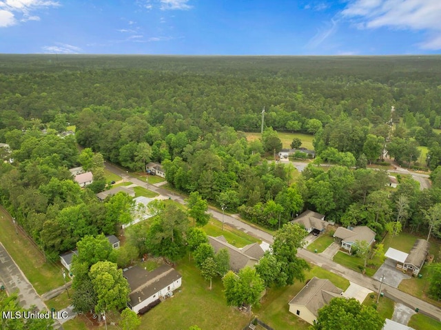 10714 Lilinoe Way, Diamondhead, MS 39525 - birds eye view of property with a residential view and a wooded view