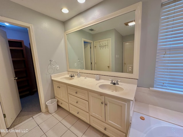 bathroom featuring vanity and tile patterned floors