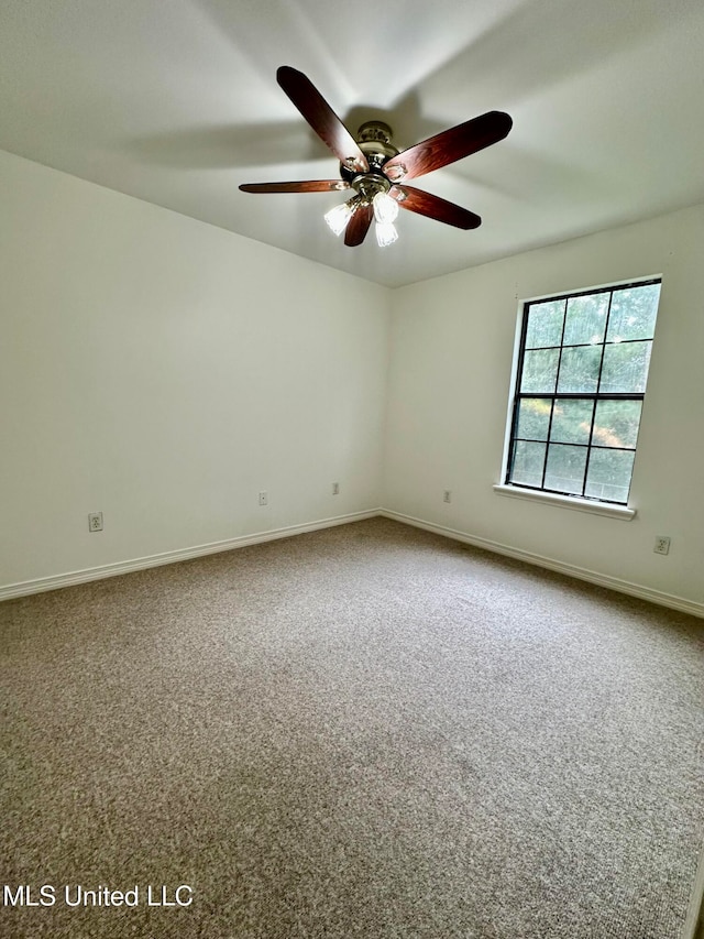 unfurnished room with carpet floors and ceiling fan