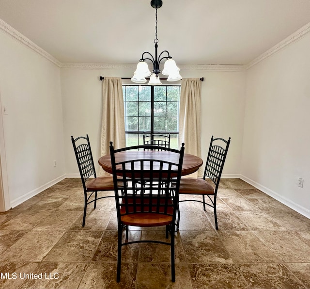 dining area featuring a notable chandelier and crown molding