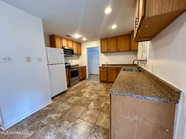 kitchen with stainless steel appliances and sink