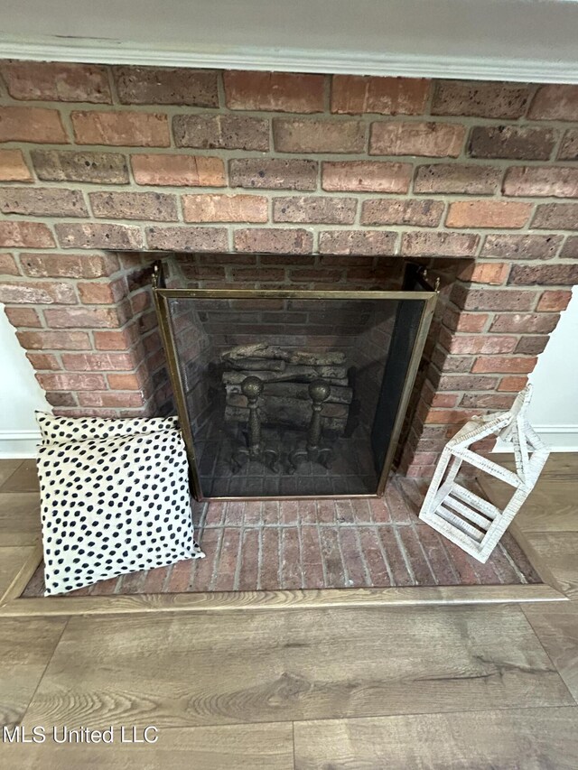 507 Reed Dr, Cleveland, MS 38732 - detailed view of a fireplace and baseboards