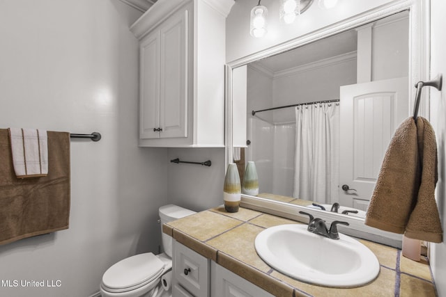 bathroom with curtained shower, vanity, toilet, and crown molding