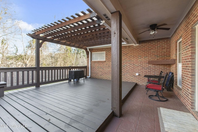 deck with a pergola and ceiling fan