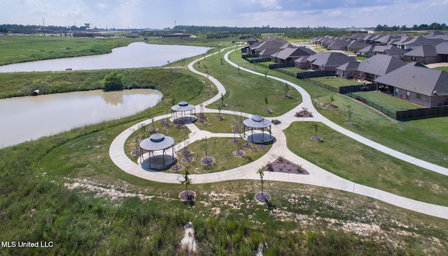 aerial view featuring a residential view and a water view