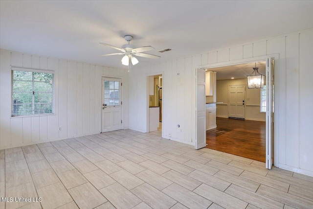 spare room with ceiling fan