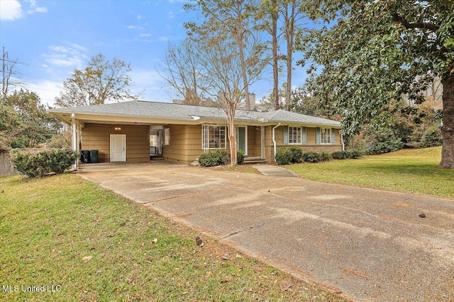 single story home featuring a front yard and a carport