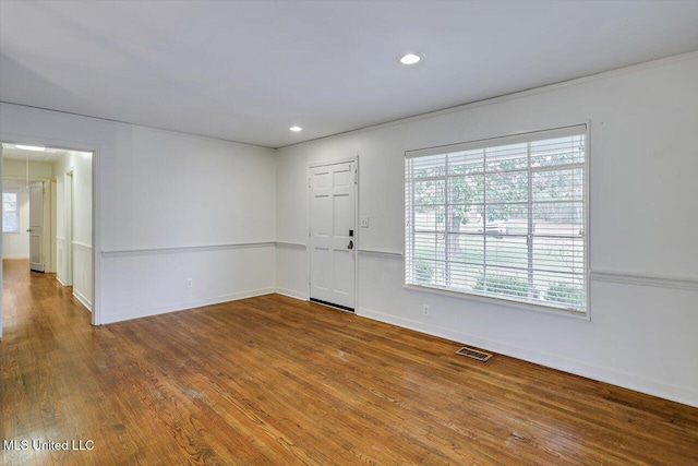 empty room with wood-type flooring