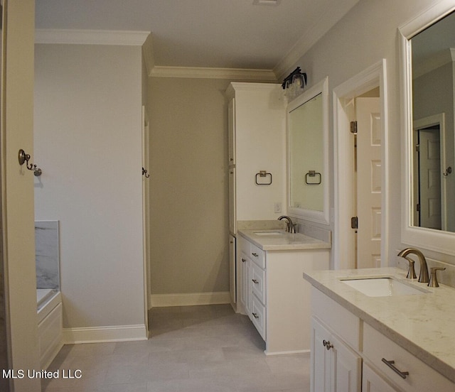 bathroom featuring vanity, a tub to relax in, and crown molding