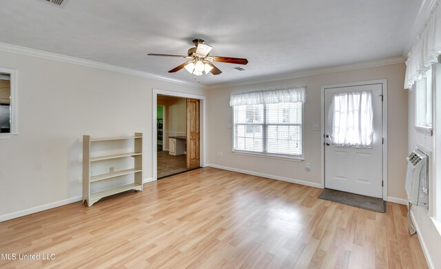 315 Church St, Madison, MS 39110 - foyer entrance with ceiling fan, light wood finished floors, ornamental molding, heating unit, and baseboards