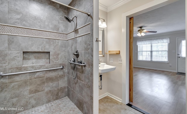 315 Church St, Madison, MS 39110 - full bath with ornamental molding, tiled shower, ceiling fan, and baseboards