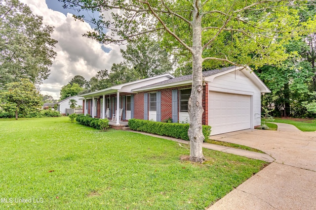 315 Church St, Madison, MS 39110 - single story home featuring a porch, a front yard, driveway, brick siding, and a garage
