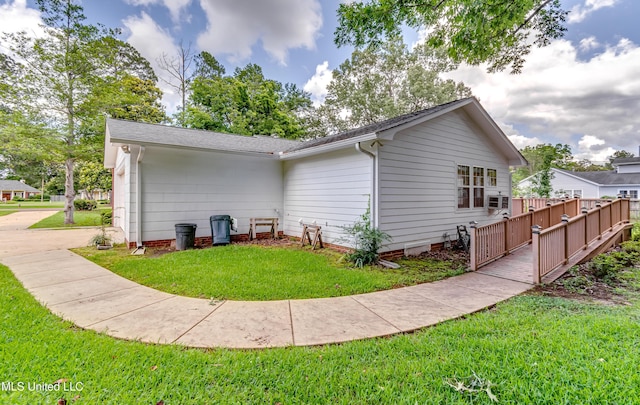 315 Church St, Madison, MS 39110 - view of home's exterior with a yard and a shingled roof