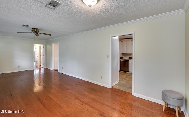 315 Church St, Madison, MS 39110 - empty room with wood-type flooring, ornamental molding, ceiling fan, a textured ceiling, and baseboards