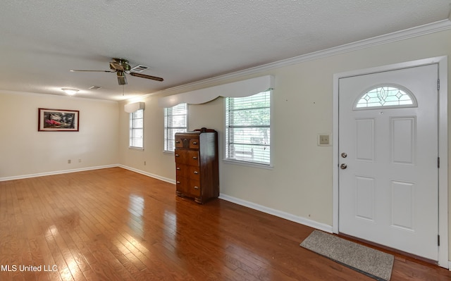 315 Church St, Madison, MS 39110 - entrance foyer featuring crown molding, hardwood / wood-style floors, plenty of natural light, and a textured ceiling
