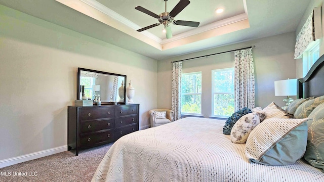 15109 Windmill Ridge Parkway, Diberville, MS 39540 - bedroom featuring crown molding, carpet, a tray ceiling, and ceiling fan