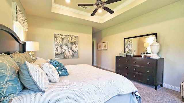 15109 Windmill Ridge Parkway, Diberville, MS 39540 - carpeted bedroom featuring ornamental molding, a raised ceiling, and ceiling fan