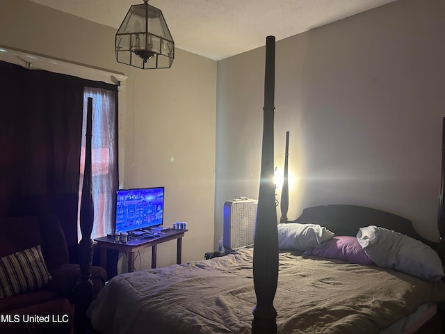 bedroom featuring a textured ceiling