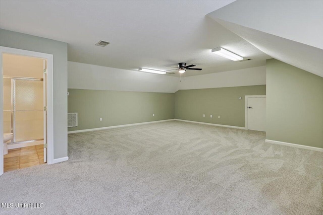 207 Keystone Pl, Brandon, MS 39042 - additional living space with carpet flooring, lofted ceiling, ceiling fan, and baseboards