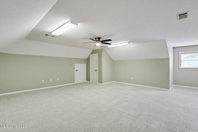 207 Keystone Pl, Brandon, MS 39042 - bonus room featuring lofted ceiling, light carpet, baseboards, and ceiling fan