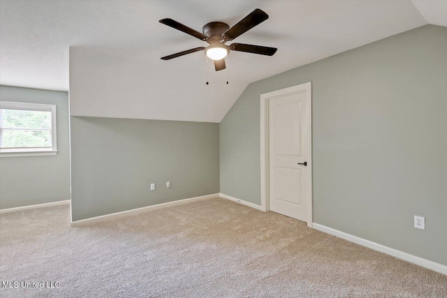 207 Keystone Pl, Brandon, MS 39042 - additional living space with vaulted ceiling, a ceiling fan, carpet flooring, and baseboards