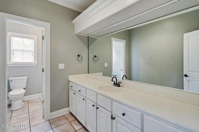 207 Keystone Pl, Brandon, MS 39042 - bathroom with vanity, toilet, tile patterned flooring, and baseboards
