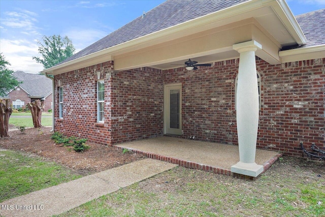 207 Keystone Pl, Brandon, MS 39042 - entrance to property with a ceiling fan, brick siding, and a shingled roof