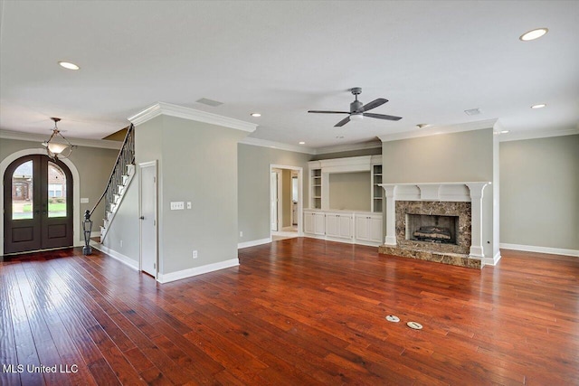 207 Keystone Pl, Brandon, MS 39042 - unfurnished living room featuring recessed lighting, crown molding, a ceiling fan, wood-type flooring, and french doors