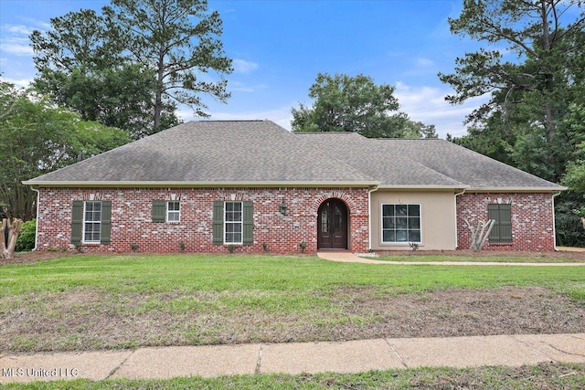 207 Keystone Pl, Brandon, MS 39042 - view of front of house featuring a shingled roof, a front yard, and brick siding